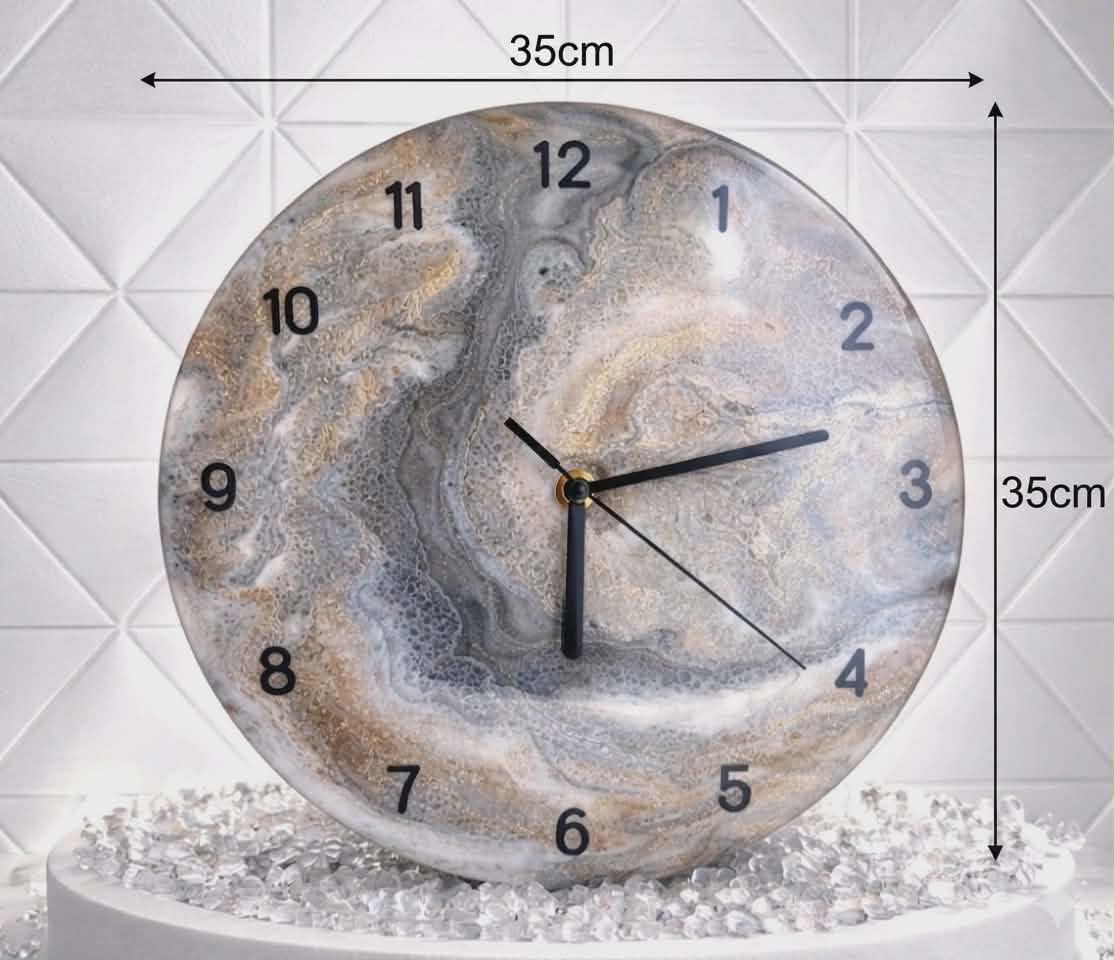 Round marble-patterned clock with measurements on a white textured background