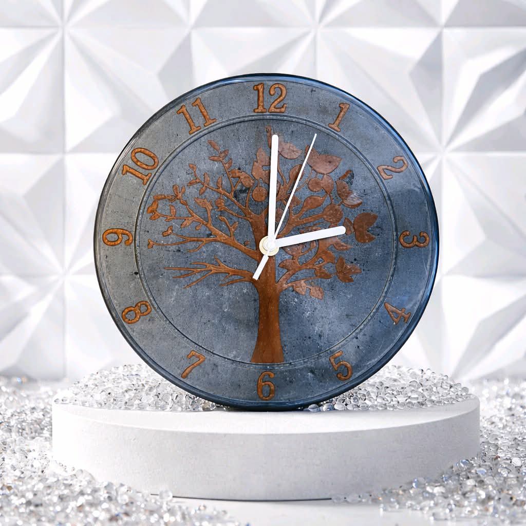 Decorative clock with tree design on a textured white background