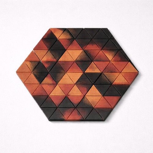 Hexagonal puzzle with triangular pieces in red and black on a white background
