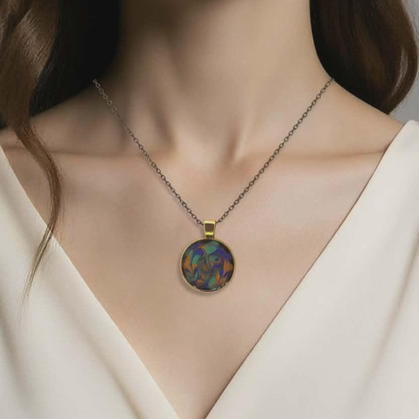 Necklace with a pendant worn by a model against a neutral background