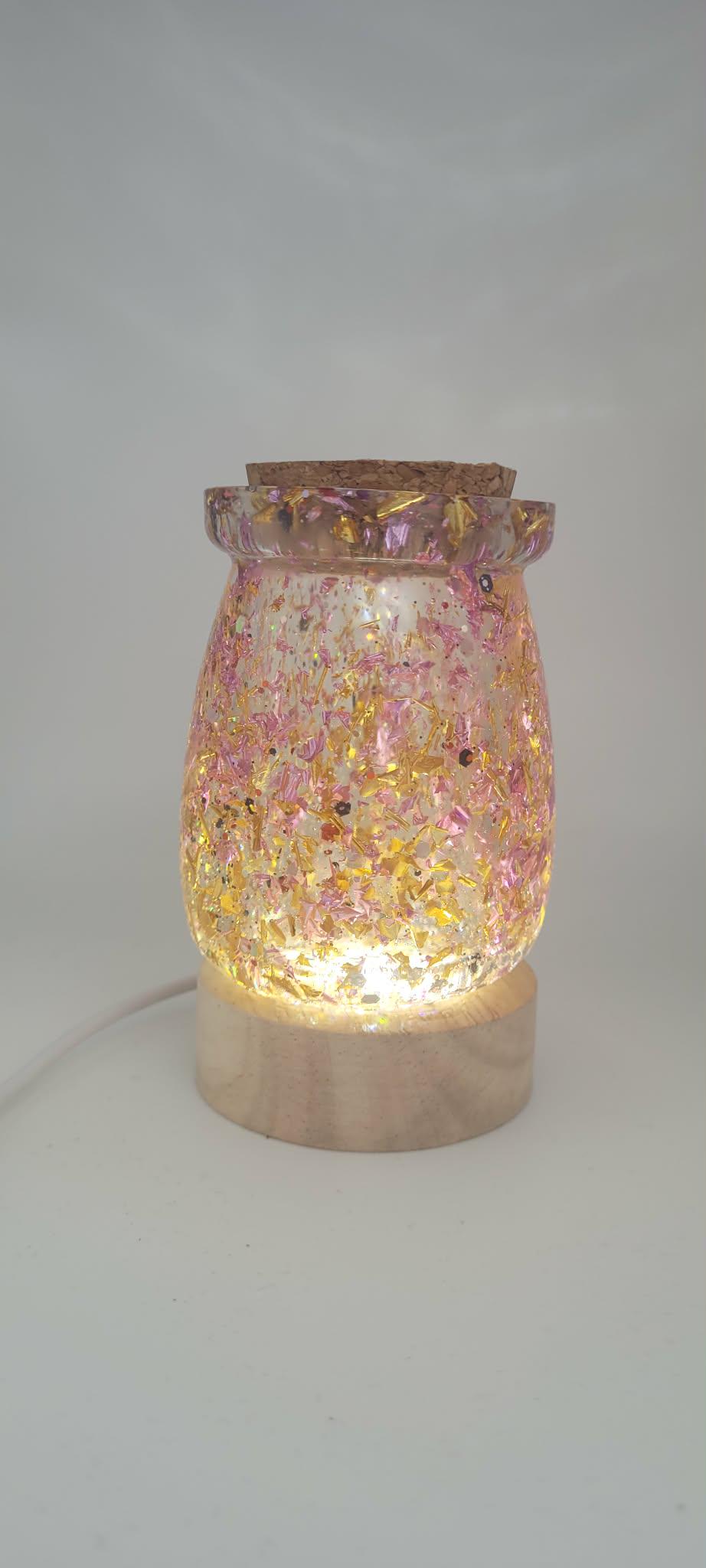 Decorative lamp with a mosaic design on a white background