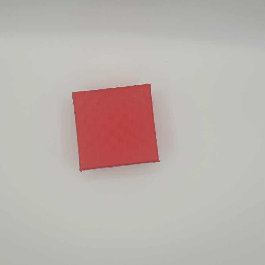 Red square gift box on a white background