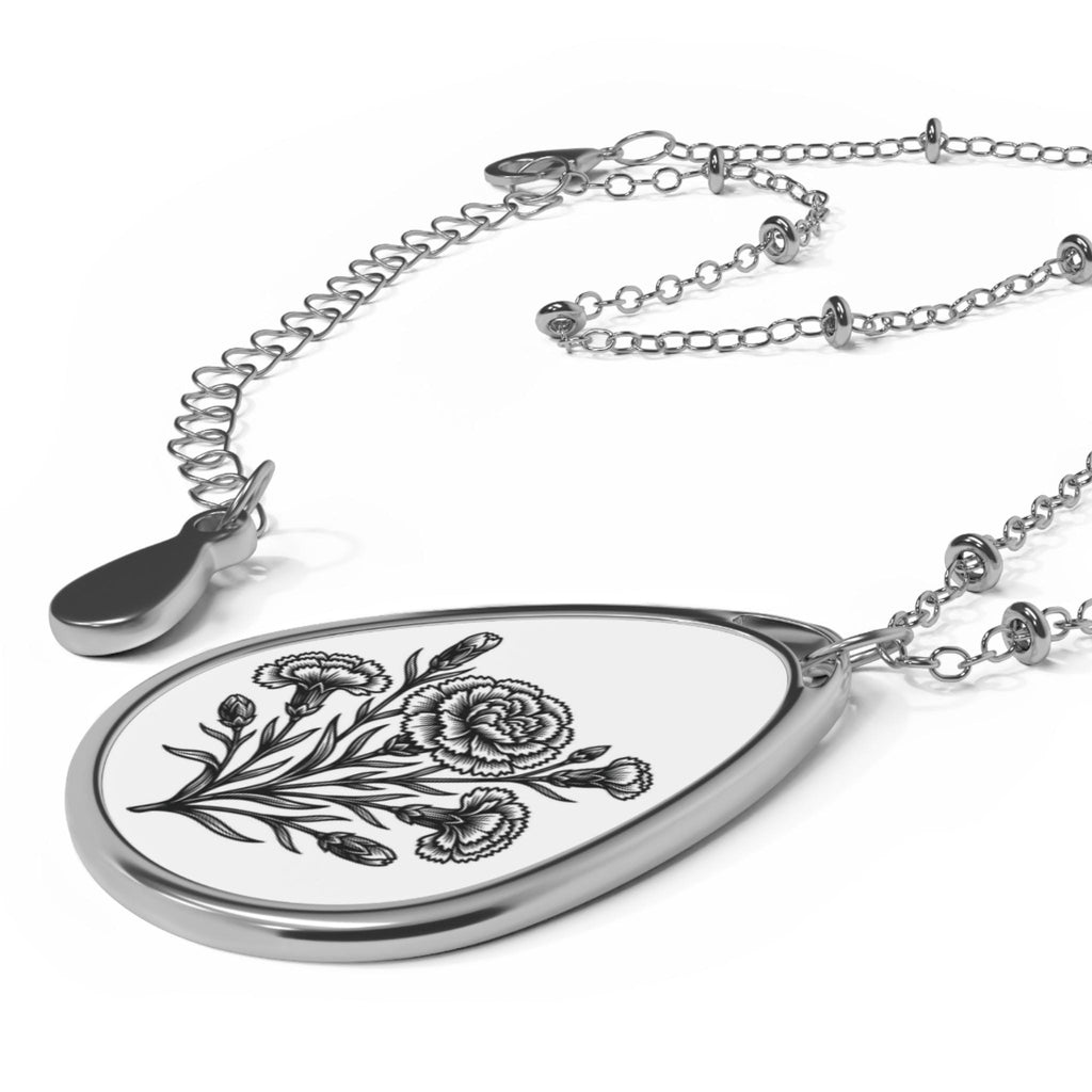 Teardrop - shaped pendant with Carnation Floral design on a white background.