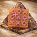 Glow in the dark resin tic tac toe set, angled view
