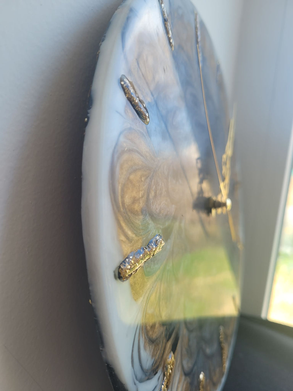 Close-up of a decorative ceramic plate with a butterfly design.