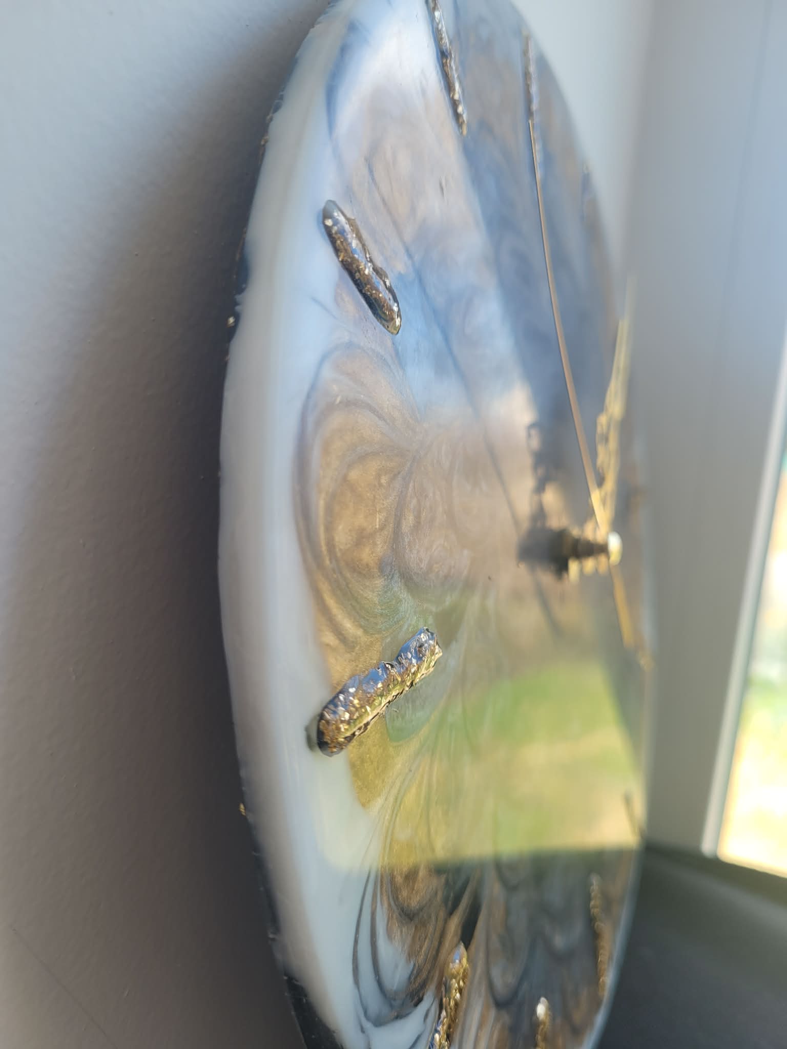 Close-up of a decorative ceramic plate with a butterfly design.