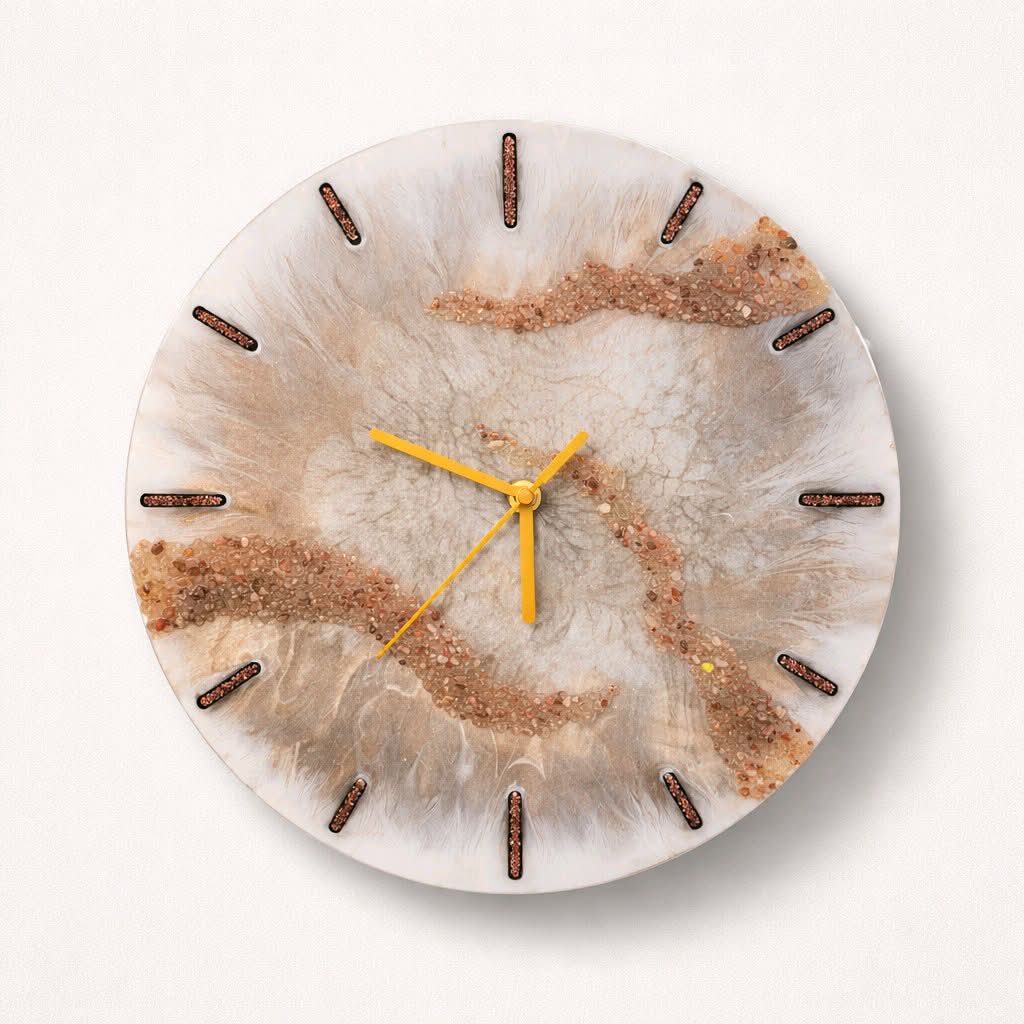 Round wall clock with a brown and beige marbled design on a white background