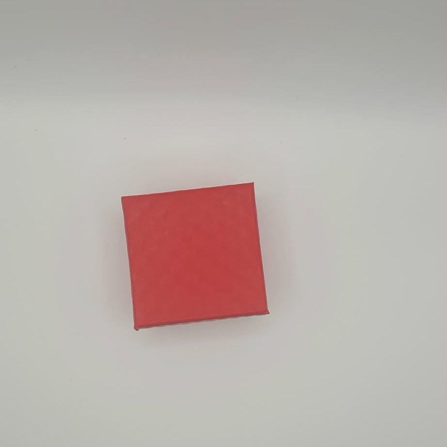 Red square gift box on a white background