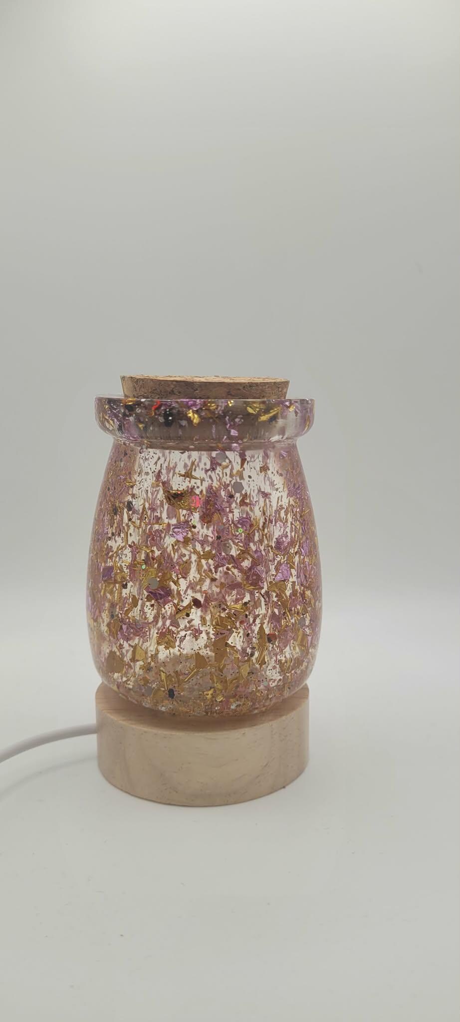 Decorative lamp with a floral design on a white background