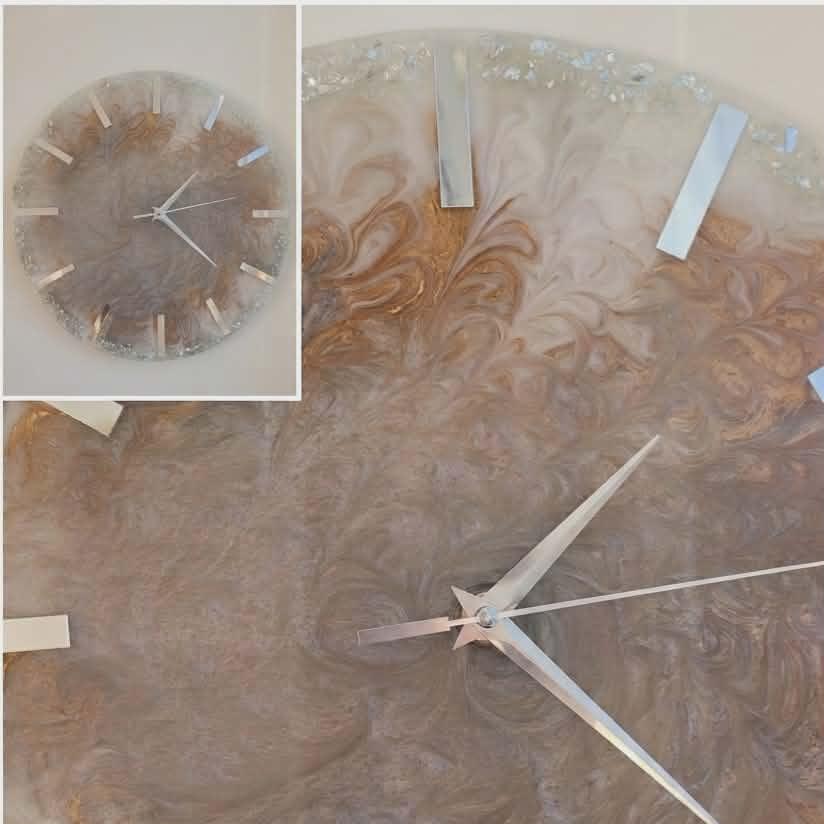 Decorative wall clock with a brown and beige marbled design, featuring a close-up inset.